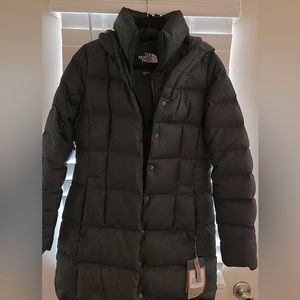 Women’s NorthFace coat. Never worn.